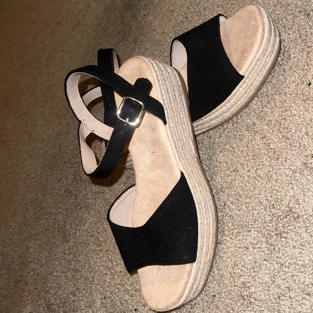 Black espadrilles never worn out! Runs big but comfortable